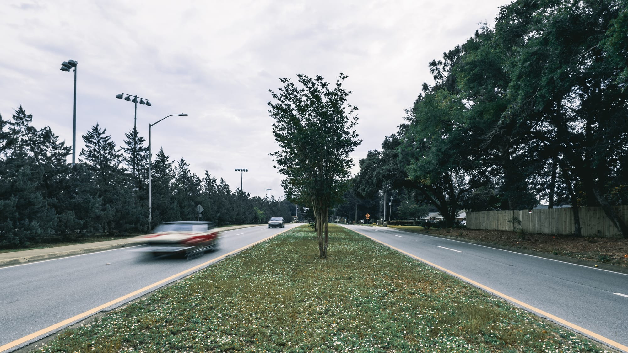 Cars seen driving on Summit Boulevard in Pensacola.